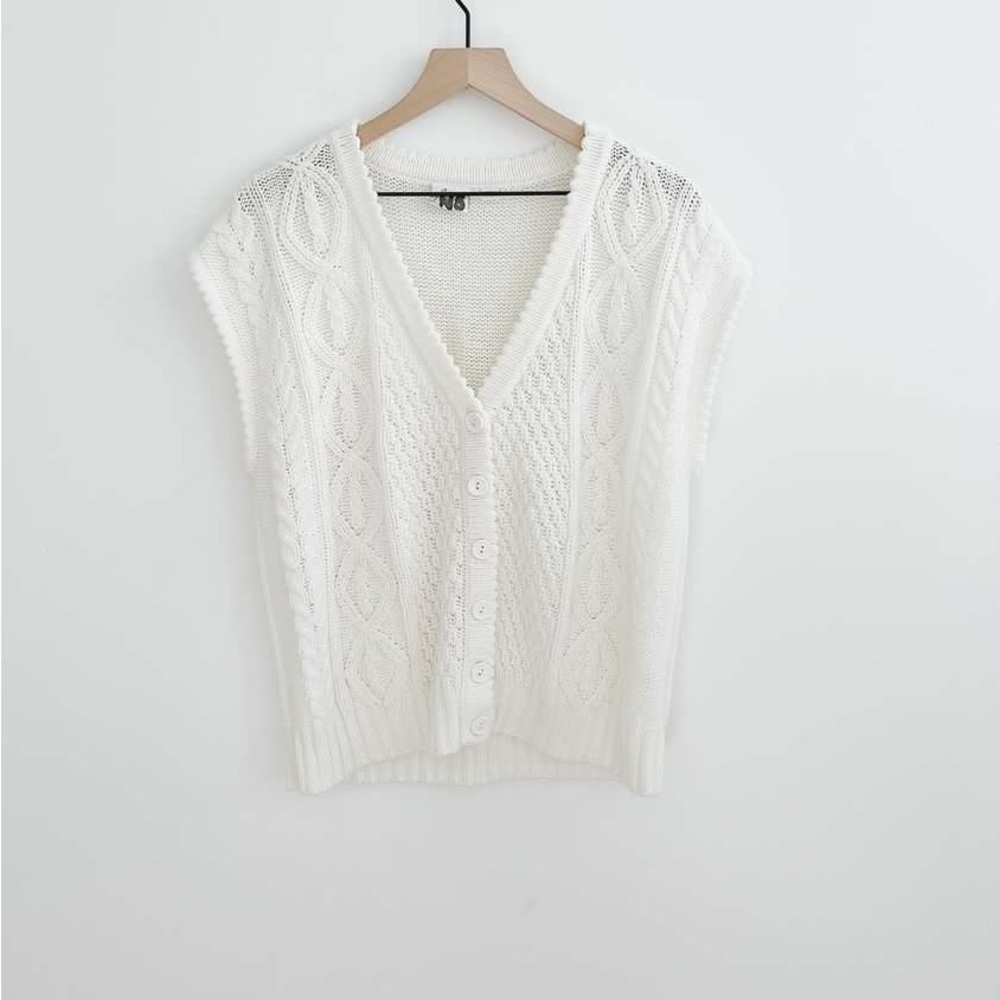 White sweater vest